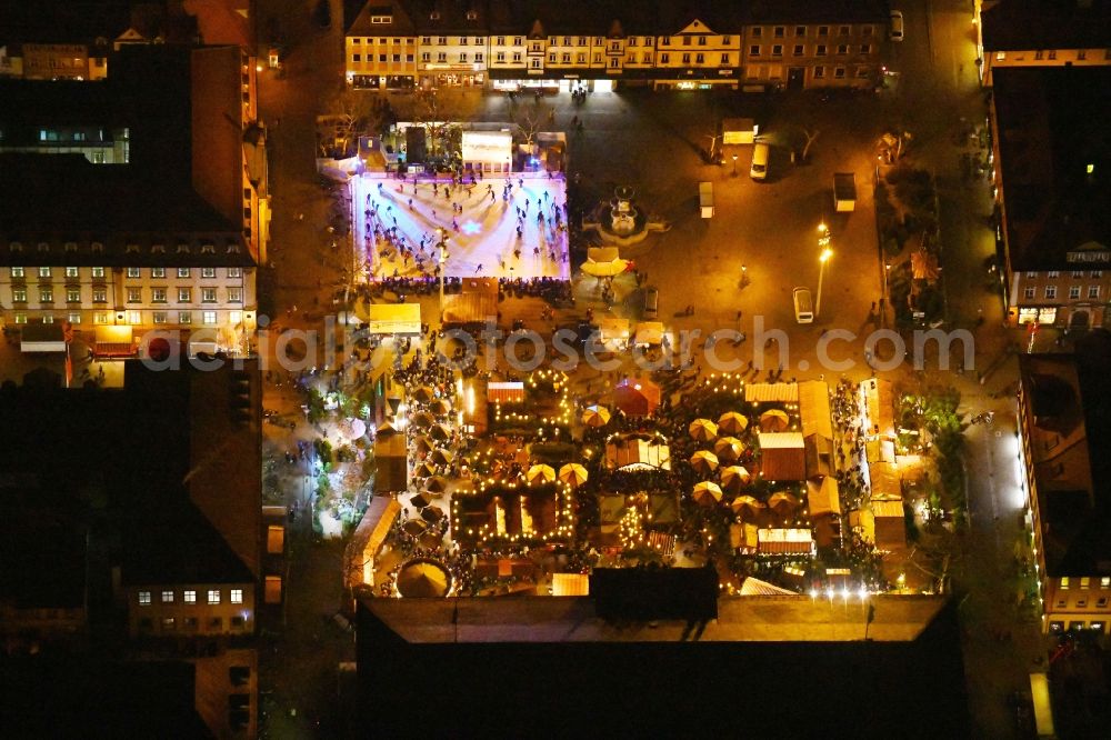 Erlangen at night from above - Night lighting Christmassy market event grounds and sale huts and booths Erlanger Waldweihnacht in the district Bruck in Erlangen in the state Bavaria, Germany