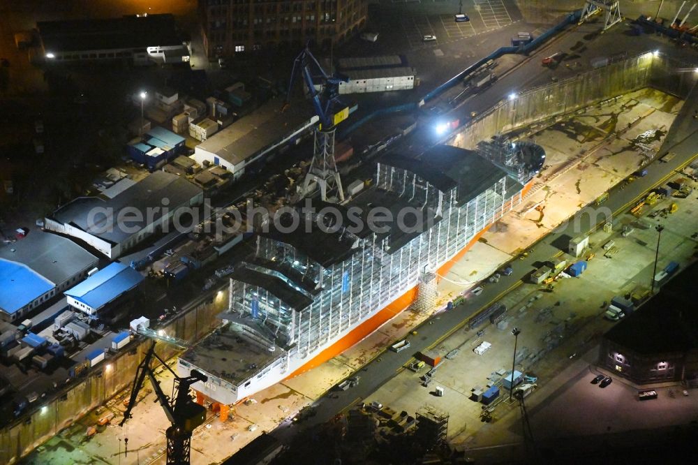 Aerial photograph at night Hamburg - Night aerial image Shipyard with supply boat Bonn (A 1413) of the Blohm + Voss dock on district Kleiner Grasbrook in Hamburg