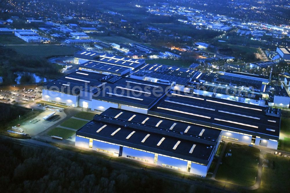 Stade at night from above - Night lighting building and production halls on the premises of Airbus Operations GmbH on Airbus-Strasse in Stade in the state Lower Saxony, Germany