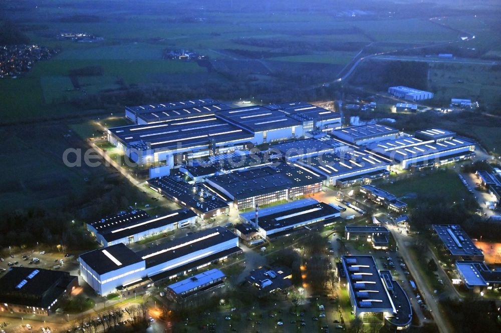 Aerial image at night Stade - Night lighting building and production halls on the premises of Airbus Operations GmbH on Airbus-Strasse in Stade in the state Lower Saxony, Germany