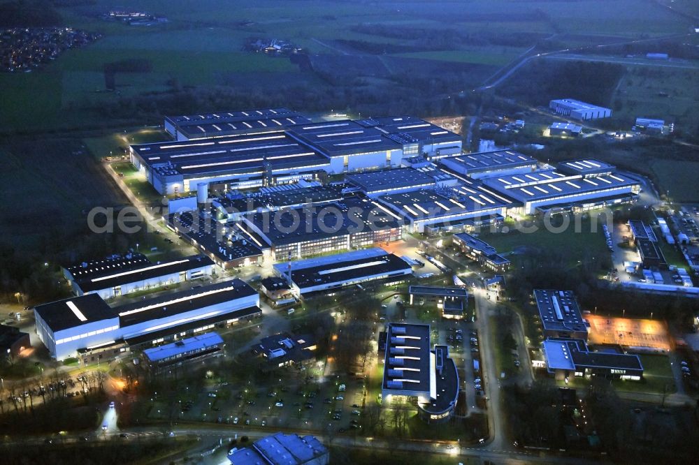 Stade at night from above - Night lighting building and production halls on the premises of Airbus Operations GmbH on Airbus-Strasse in Stade in the state Lower Saxony, Germany