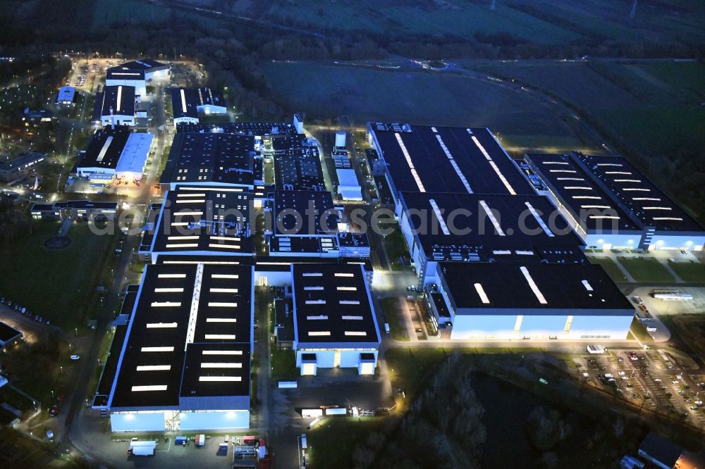 Stade at night from above - Night lighting building and production halls on the premises of Airbus Operations GmbH on Airbus-Strasse in Stade in the state Lower Saxony, Germany