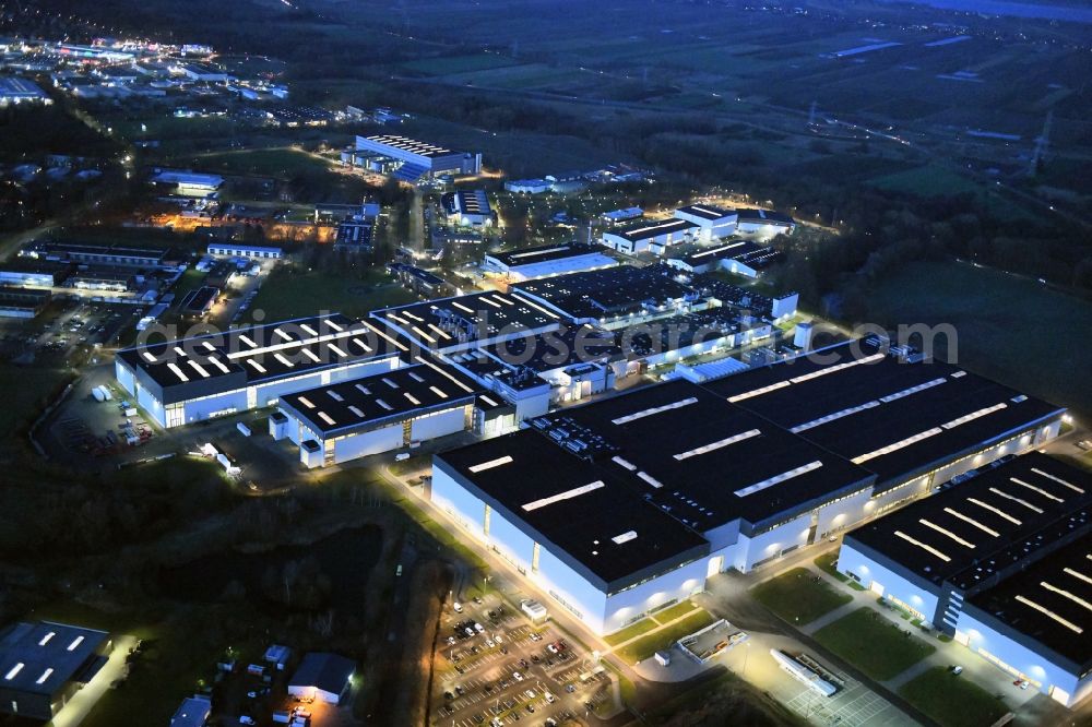 Stade at night from above - Night lighting building and production halls on the premises of Airbus Operations GmbH on Airbus-Strasse in Stade in the state Lower Saxony, Germany