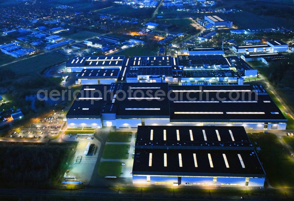 Stade at night from above - Night lighting building and production halls on the premises of Airbus Operations GmbH on Airbus-Strasse in Stade in the state Lower Saxony, Germany