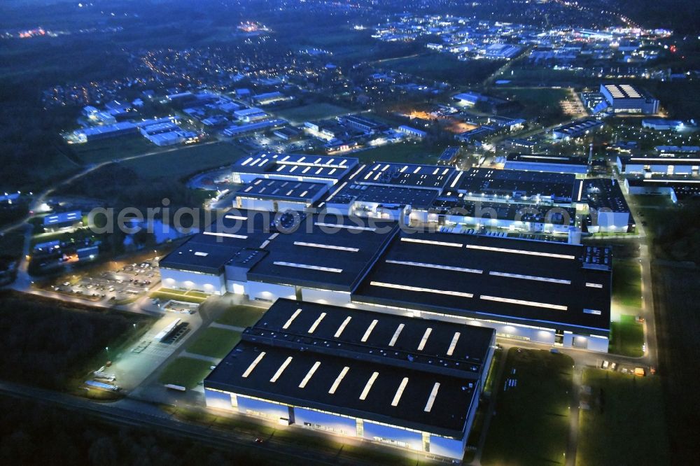 Aerial photograph at night Stade - Night lighting building and production halls on the premises of Airbus Operations GmbH on Airbus-Strasse in Stade in the state Lower Saxony, Germany