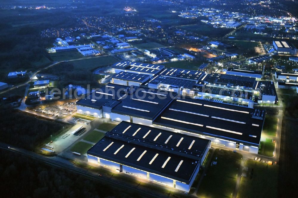 Aerial image at night Stade - Night lighting building and production halls on the premises of Airbus Operations GmbH on Airbus-Strasse in Stade in the state Lower Saxony, Germany