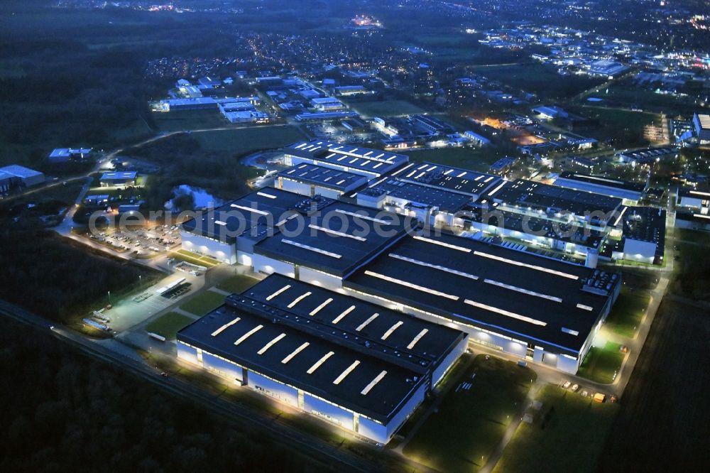 Stade at night from above - Night lighting building and production halls on the premises of Airbus Operations GmbH on Airbus-Strasse in Stade in the state Lower Saxony, Germany