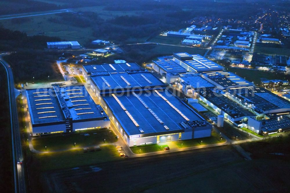 Stade at night from the bird perspective: Night lighting building and production halls on the premises of Airbus Operations GmbH on Airbus-Strasse in Stade in the state Lower Saxony, Germany