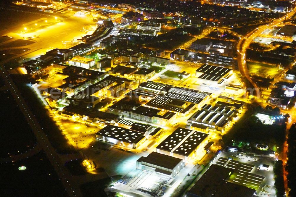 Bremen at night from above - Night lighting Building and production halls on the premises of Airbus SE on Airbus-Allee in the district Neustadt in Bremen, Germany