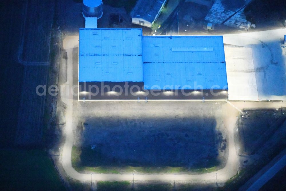 Gardelegen at night from above - Night lighting Building and production halls on the premises of Carl Bechem GmbH on Kurze Strasse in the district Mieste in Gardelegen in the state Saxony-Anhalt, Germany