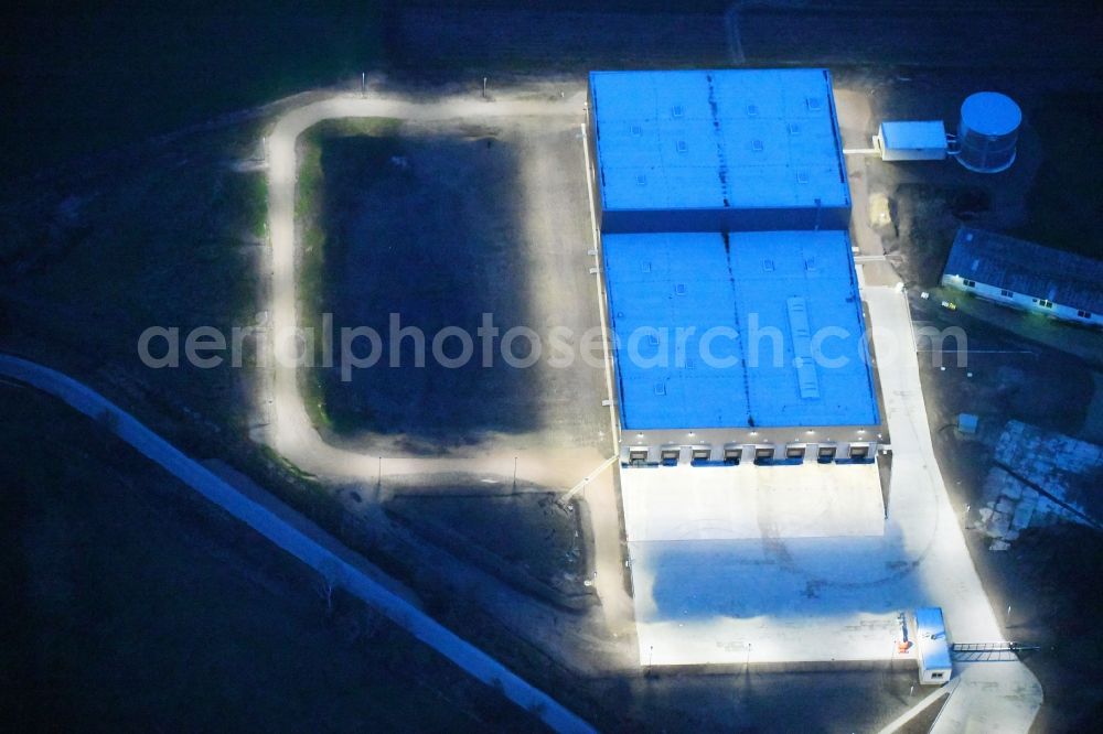 Aerial photograph at night Gardelegen - Night lighting Building and production halls on the premises of Carl Bechem GmbH on Kurze Strasse in the district Mieste in Gardelegen in the state Saxony-Anhalt, Germany