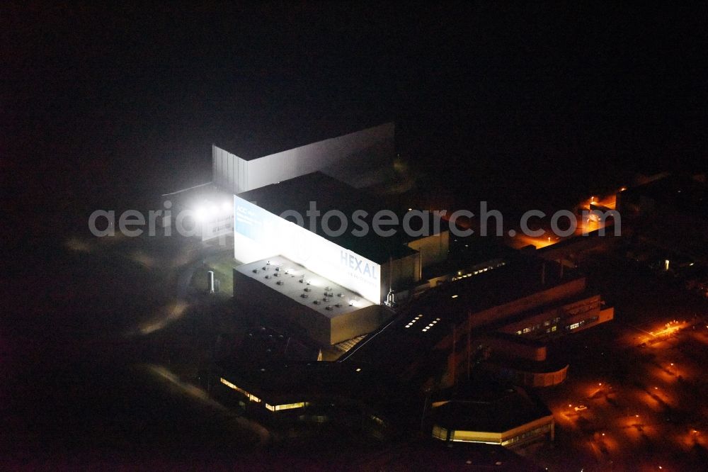 Barleben at night from above - Night lighting Building and production halls on the premises of the chemical manufacturers Salutas Pharma GmbH an der Otto-von-Guericke-Allee in the district Suelzegrund in Barleben in the state Saxony-Anhalt