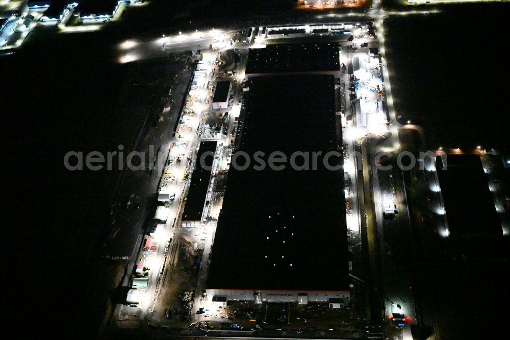 Aerial photograph at night Arnstadt - Night lighting factory premises of Contemporary Amperex Technology Thuringia GmbH Am Luetzer Feld in the district Bittstaedt in the district Rudisleben in Arnstadt in the state Thuringia, Germany