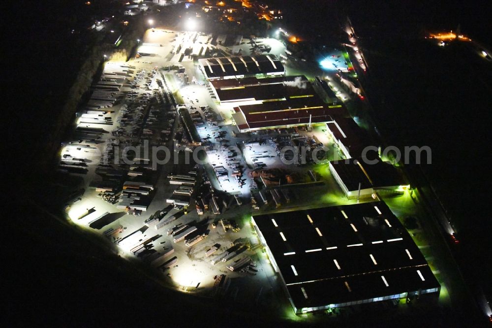 Niedere Börde at night from above - Night lighting Building and production halls on the premises Dachziegelwerke Nelskamp GmbH in Niedere Boerde in the state Saxony-Anhalt, Germany