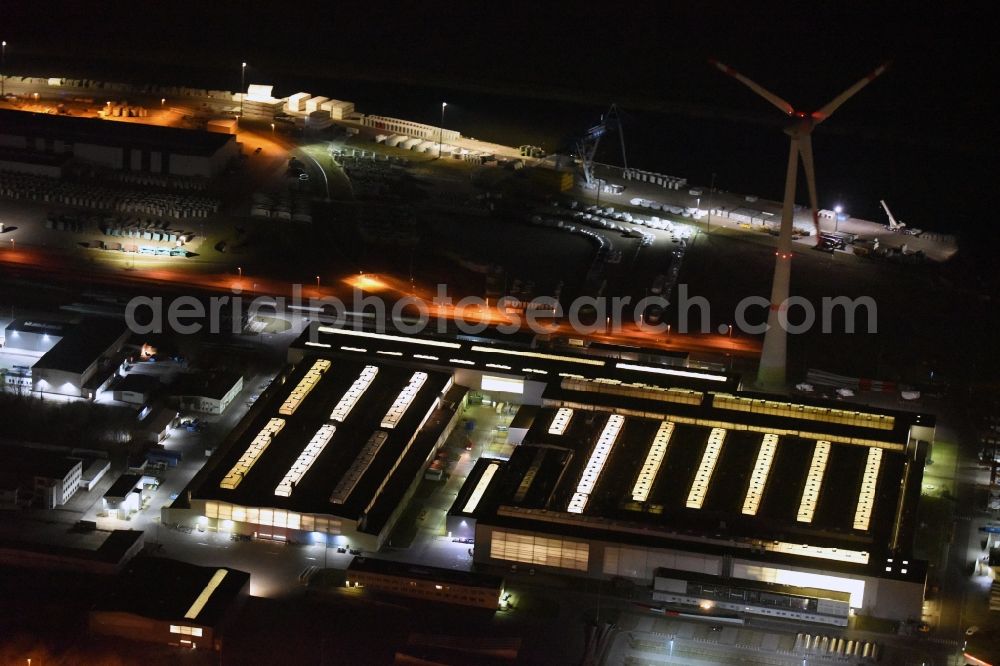 Magdeburg at night from the bird perspective: Night lighting premises of the wind turbine manufacturer ENERCON GmbH in Magdeburg in Saxony-Anhalt