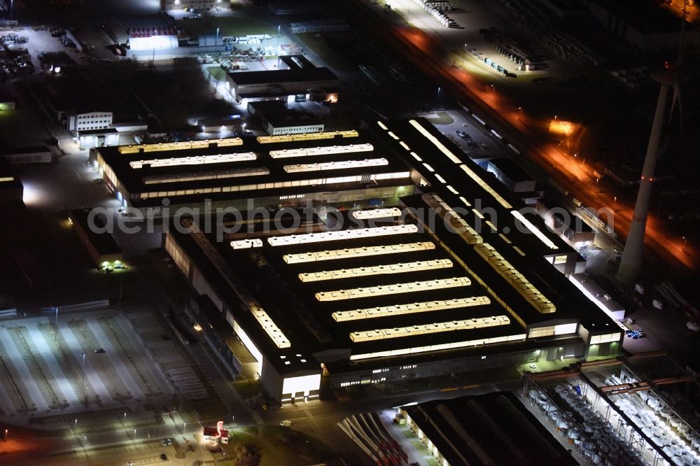 Magdeburg at night from the bird perspective: Night lighting premises of the wind turbine manufacturer ENERCON GmbH in Magdeburg in Saxony-Anhalt