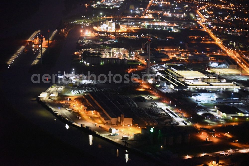 Magdeburg at night from the bird perspective: Night lighting premises of the wind turbine manufacturer ENERCON GmbH in Magdeburg in Saxony-Anhalt