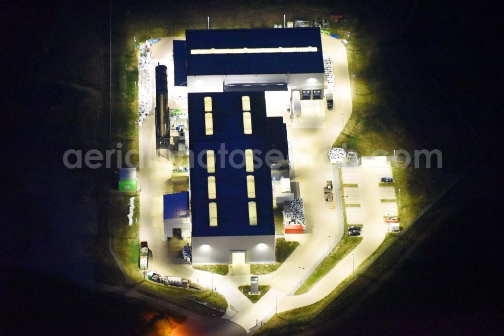 Schwerin at night from above - Night lighting night view building and production halls on the premises of FVH Folienveredelung an der Ludwig-Boelkow-Strasse in Schwerin in the state Mecklenburg - Western Pomerania