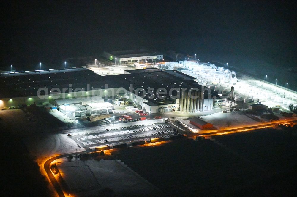 Aerial photograph at night Tanna - Night lighting Building and production halls on the premises GEALAN Tanna Fenster-Systeme GmbH in Industriegebiet Kapelle in Tanna in the state Thuringia, Germany