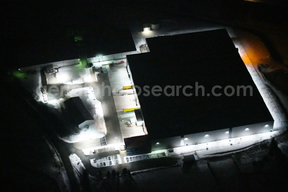 Aerial image at night Tanna - Night lighting Building and production halls on the premises of Geis Industrie-Service GmbH in the district Seubtendorf in Tanna in the state Thuringia, Germany