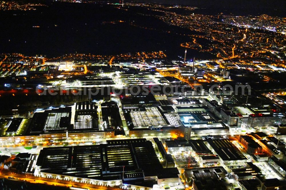 Aerial image at night Stuttgart - Night lighting building and production halls on the premises of Merceof-Benz Nieoflassung on Ufer of Neckar in the district Untertuerkheim in Stuttgart in the state Baden-Wurttemberg, Germany