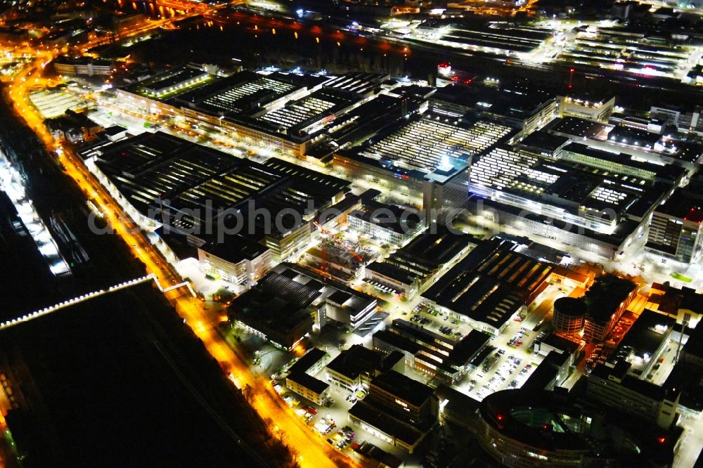 Stuttgart at night from above - Night lighting building and production halls on the premises of Merceof-Benz Nieoflassung on Ufer of Neckar in the district Untertuerkheim in Stuttgart in the state Baden-Wurttemberg, Germany