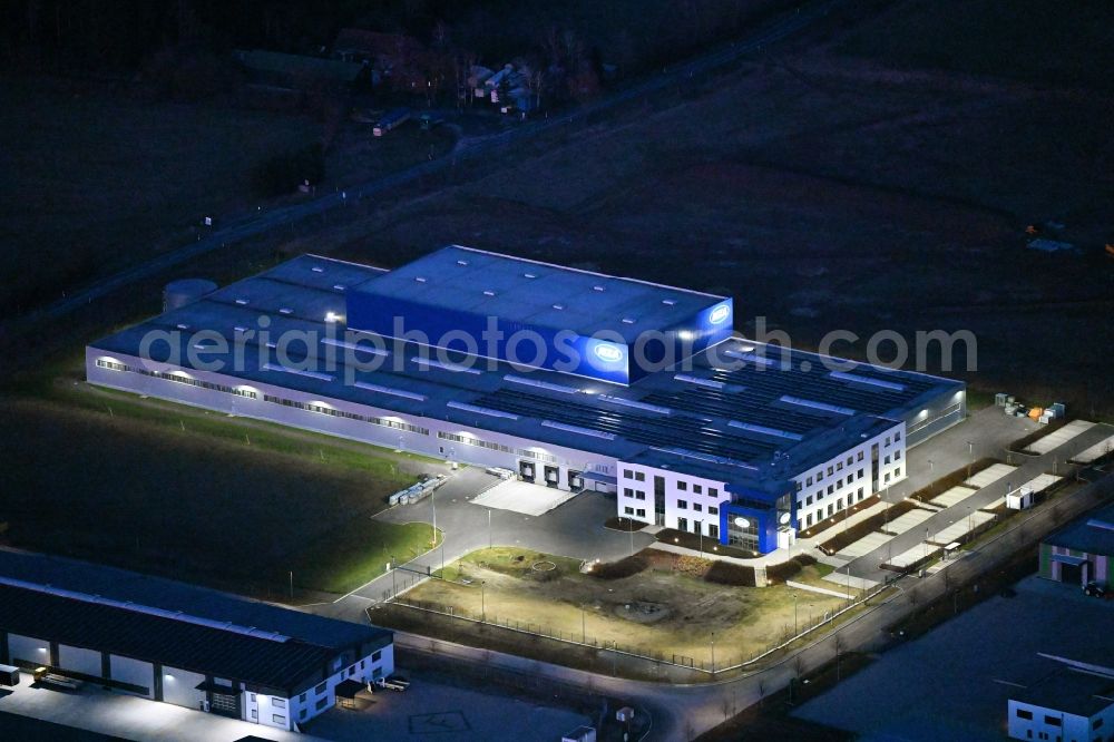 Meiningen at night from above - Night lighting building and production halls on the premises of MZA Meyer-Zweiradtechnik GmbH on street Zeppelinstrasse in Meiningen in the state Thuringia, Germany