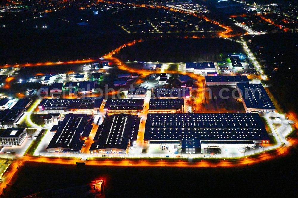 Aerial photograph at night Oranienburg - Night lighting building and production halls on the premises of ORAFOL Europe GmbH on Orafolstrasse in Oranienburg in the state Brandenburg, Germany