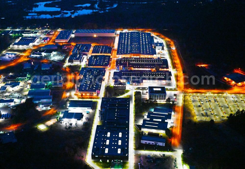 Aerial photograph at night Oranienburg - Night lighting building and production halls on the premises of ORAFOL Europe GmbH on Orafolstrasse in Oranienburg in the state Brandenburg, Germany