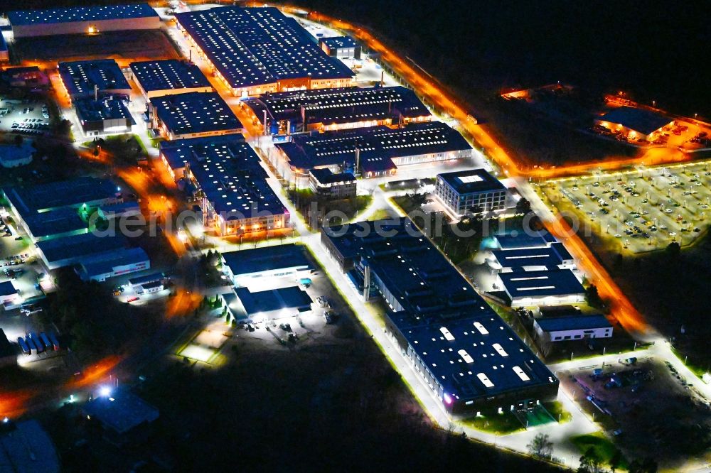 Aerial image at night Oranienburg - Night lighting building and production halls on the premises of ORAFOL Europe GmbH on Orafolstrasse in Oranienburg in the state Brandenburg, Germany