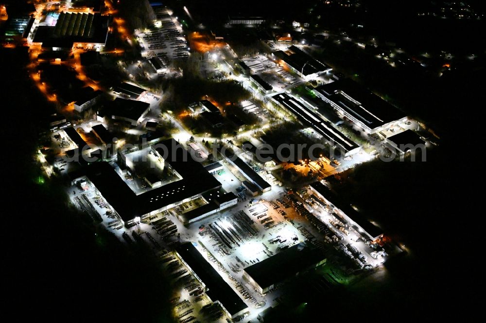 Aerial image at night Schwerin - Night lighting building and production halls on the premises of Prysmian Kabel und Systeme GmbH on Siemensplatz in Schwerin in the state Mecklenburg - Western Pomerania, Germany