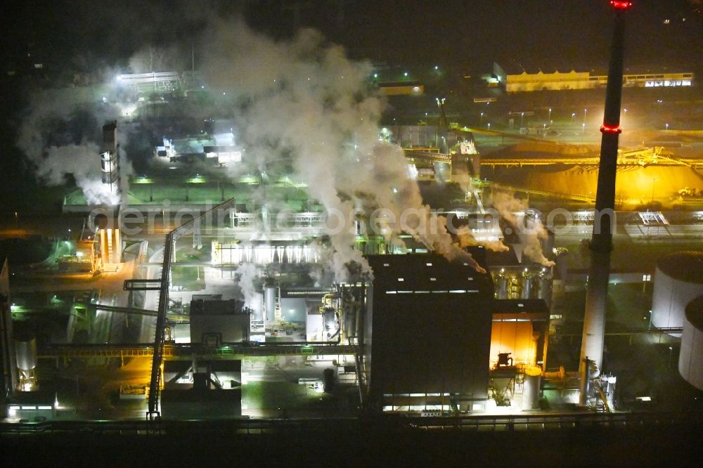 Grana at night from above - Night lighting Building and production halls on the premises of Suedzucker AG on Kreisstrasse in Grana in the state Saxony-Anhalt, Germany