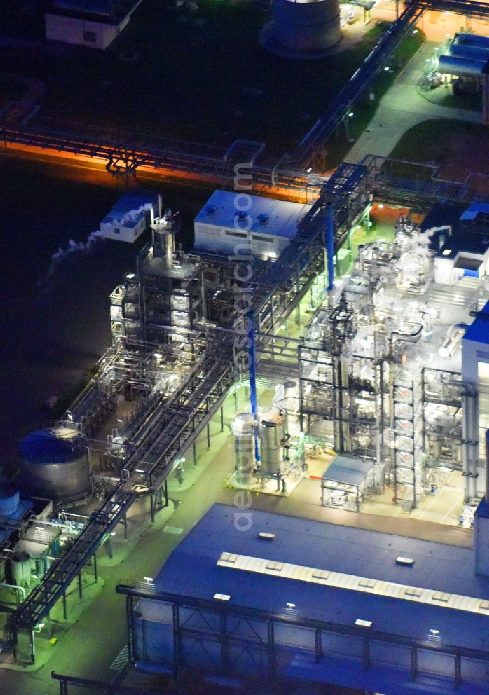 Piesteritz at night from above - Night lighting refinery equipment and management systems on the factory premises of the chemical manufacturers of SKW Stickstoffwerke Piesteritz GmbH in Piesteritz in the state Saxony-Anhalt, Germany