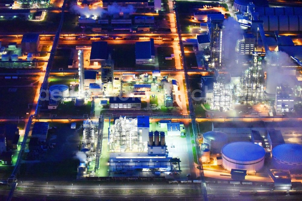 Piesteritz at night from above - Night lighting refinery equipment and management systems on the factory premises of the chemical manufacturers of SKW Stickstoffwerke Piesteritz GmbH in Piesteritz in the state Saxony-Anhalt, Germany