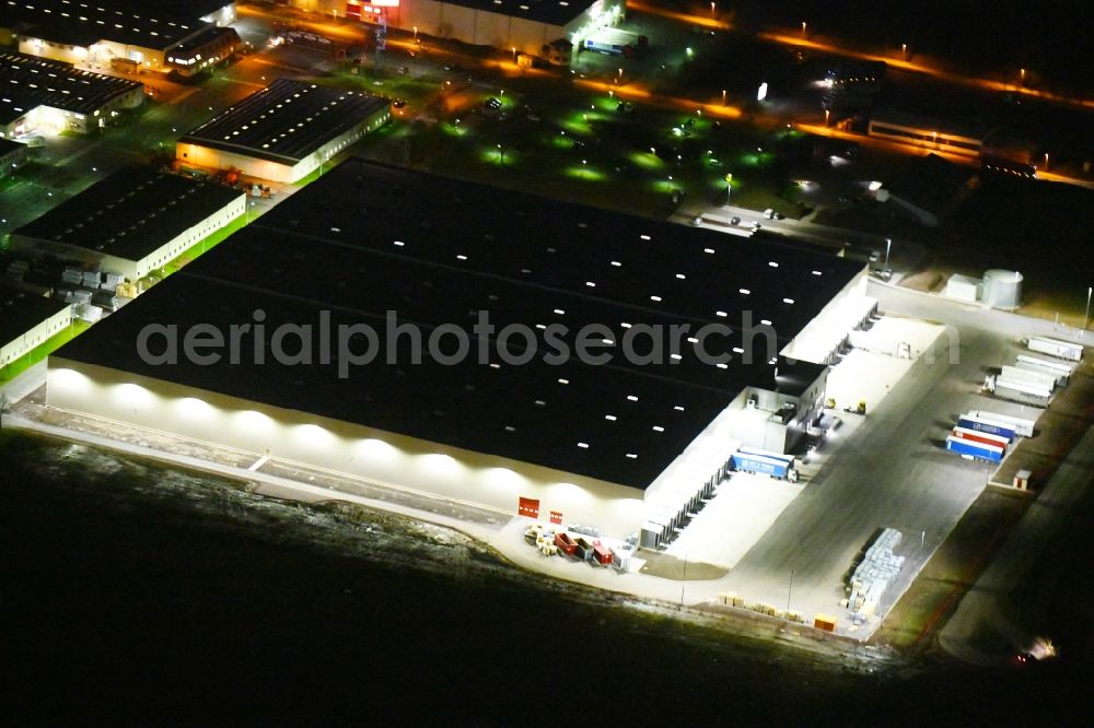 Sonneborn at night from above - Night lighting Building and production halls on the premises of VELUX Deutschland GmbH on Arzbach in Sonneborn in the state Thuringia, Germany