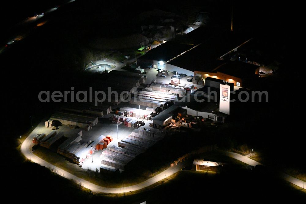 Aerial photograph at night Eisenberg - Night lighting building and production halls on the premises of Wienerberger GmbH in Eisenberg in the state Thuringia, Germany