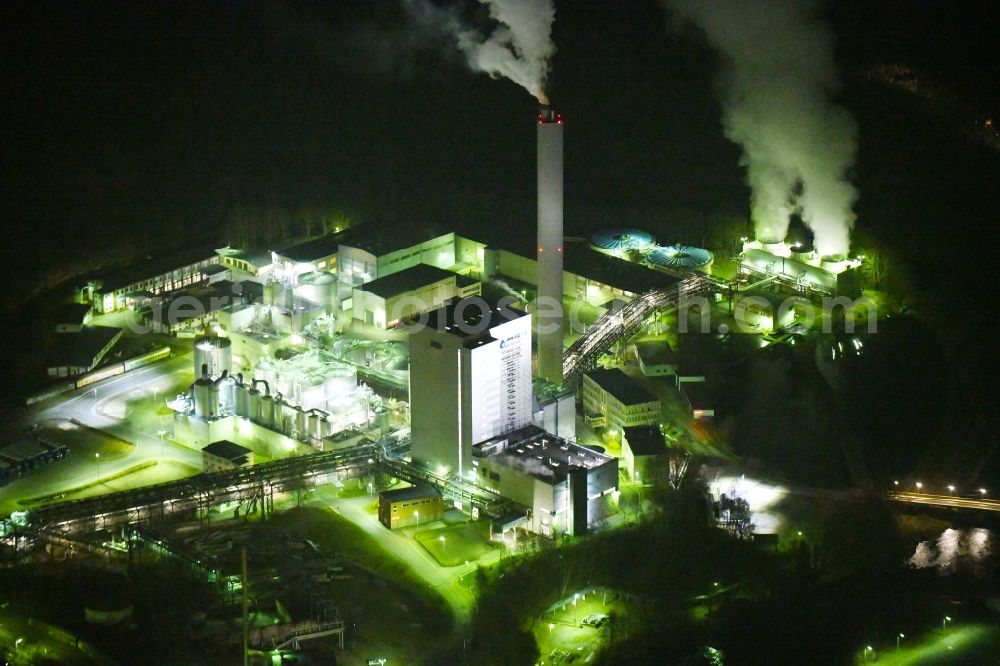 Blankenstein at night from above - Night lighting Building and production halls on the premises of Zellstoff- and Papierfabrik Rosenthal GmbH on Hauptstrasse in Blankenstein in the state Thuringia, Germany