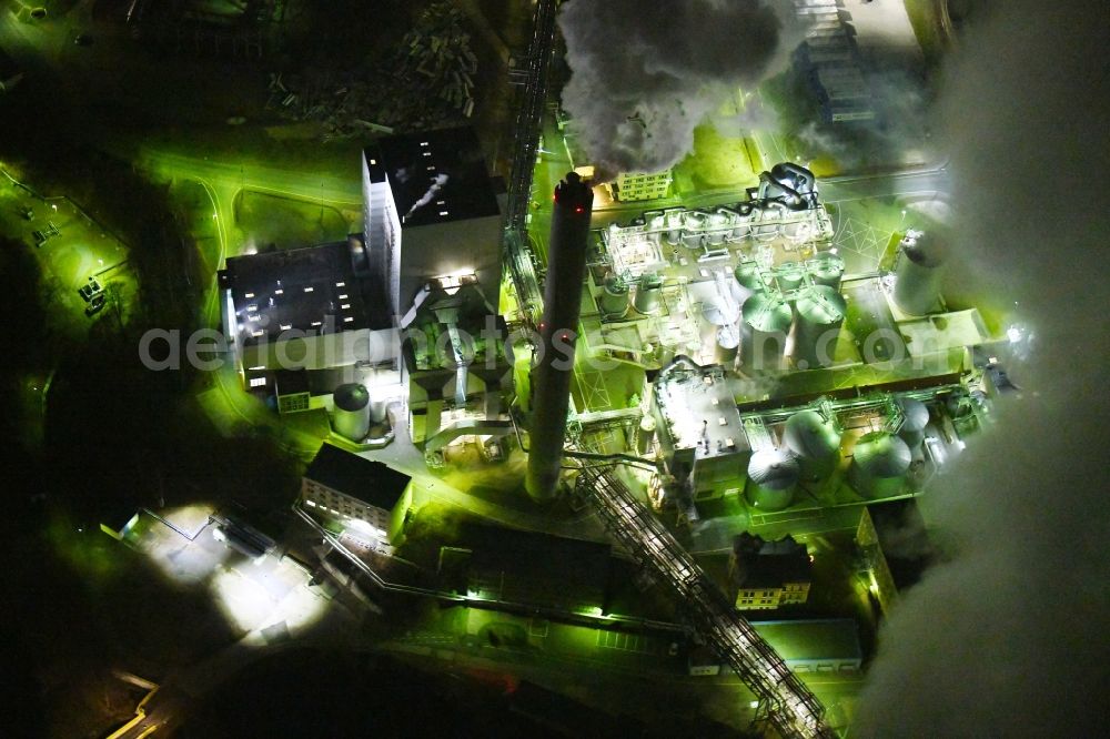 Blankenstein at night from the bird perspective: Night lighting Building and production halls on the premises of Zellstoff- and Papierfabrik Rosenthal GmbH on Hauptstrasse in Blankenstein in the state Thuringia, Germany