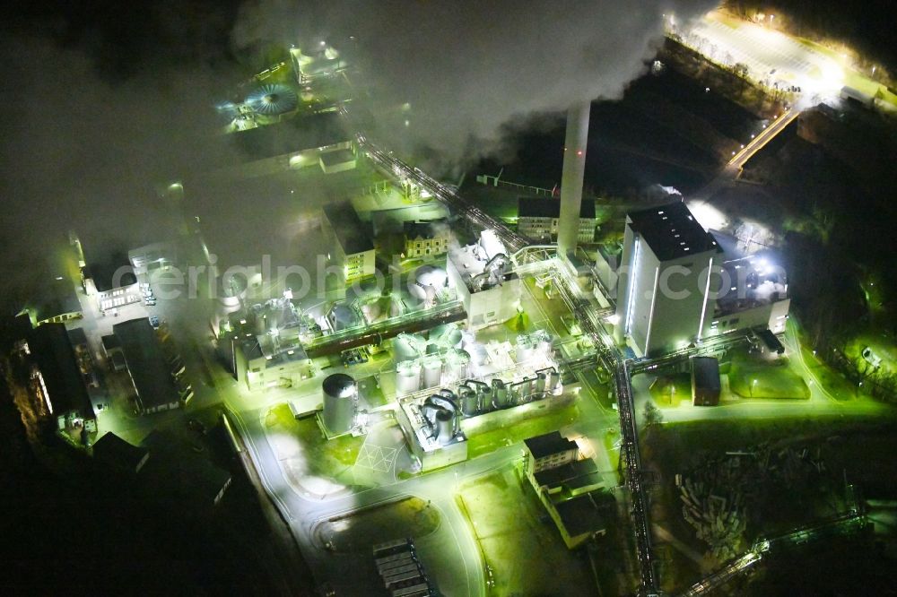 Blankenstein at night from above - Night lighting Building and production halls on the premises of Zellstoff- and Papierfabrik Rosenthal GmbH on Hauptstrasse in Blankenstein in the state Thuringia, Germany