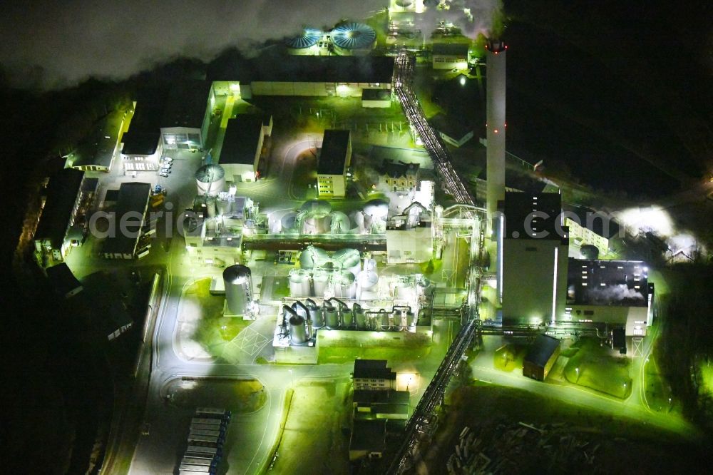 Aerial image at night Blankenstein - Night lighting Building and production halls on the premises of Zellstoff- and Papierfabrik Rosenthal GmbH on Hauptstrasse in Blankenstein in the state Thuringia, Germany