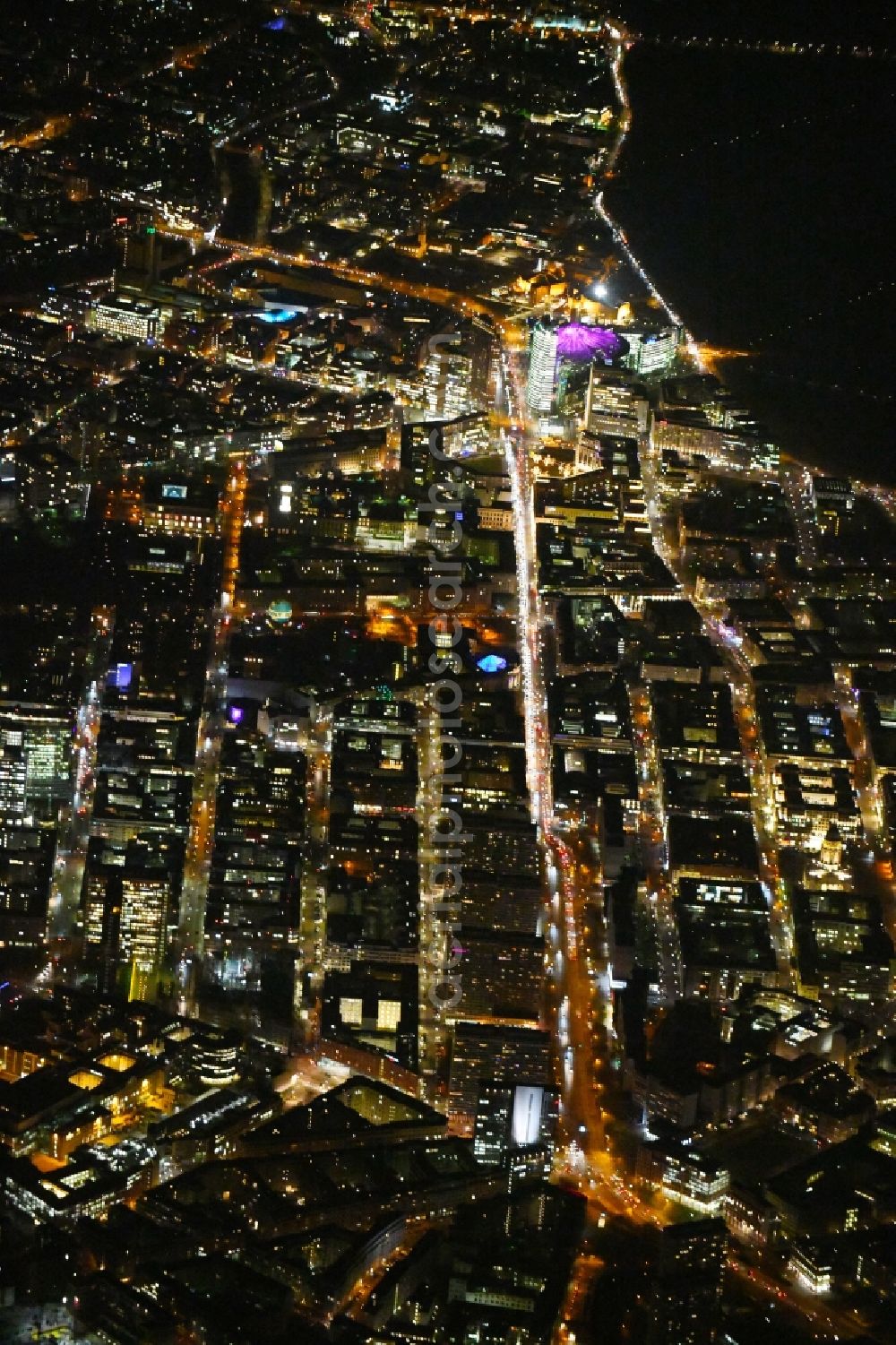 Aerial image at night Berlin - Night lighting Residential area of the multi-family house settlement on Spittelmarkt along the Leipziger Strasse corner Friedrichstrasse in the district Mitte in Berlin, Germany