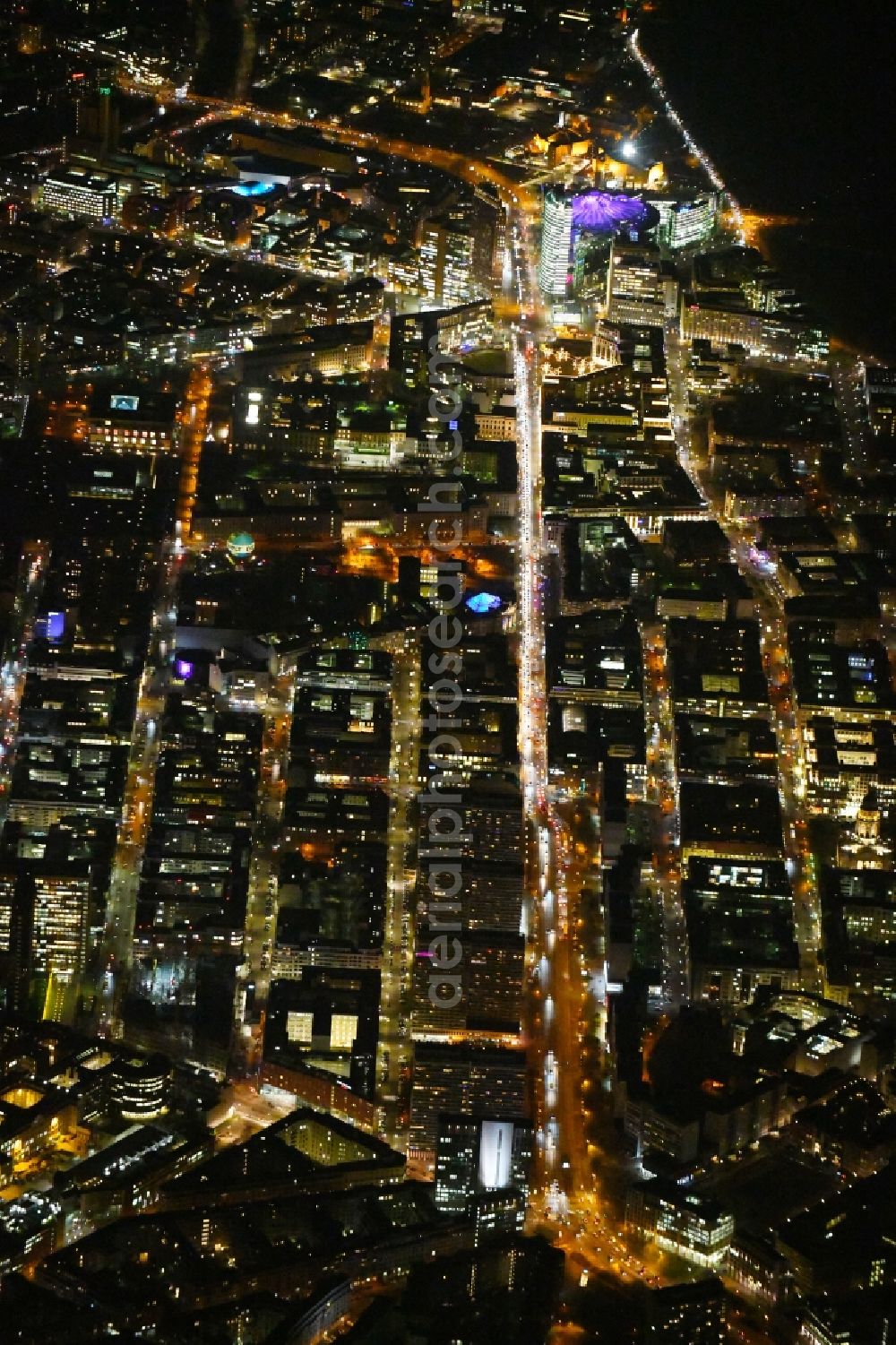 Berlin at night from the bird perspective: Night lighting Residential area of the multi-family house settlement on Spittelmarkt along the Leipziger Strasse corner Friedrichstrasse in the district Mitte in Berlin, Germany