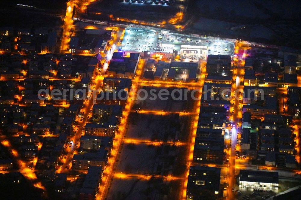 Aerial image at night Lübeck - Night lighting residential area along the park Carlebach-Park in the district Strecknitz in Luebeck in the state Schleswig-Holstein, Germany