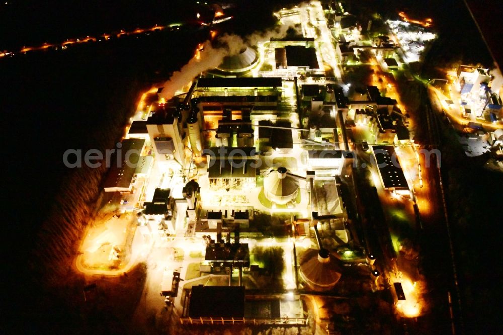 Aerial photograph at night Rüdersdorf - Night lighting cEMEX cement plant in Ruedersdorf in Brandenburg