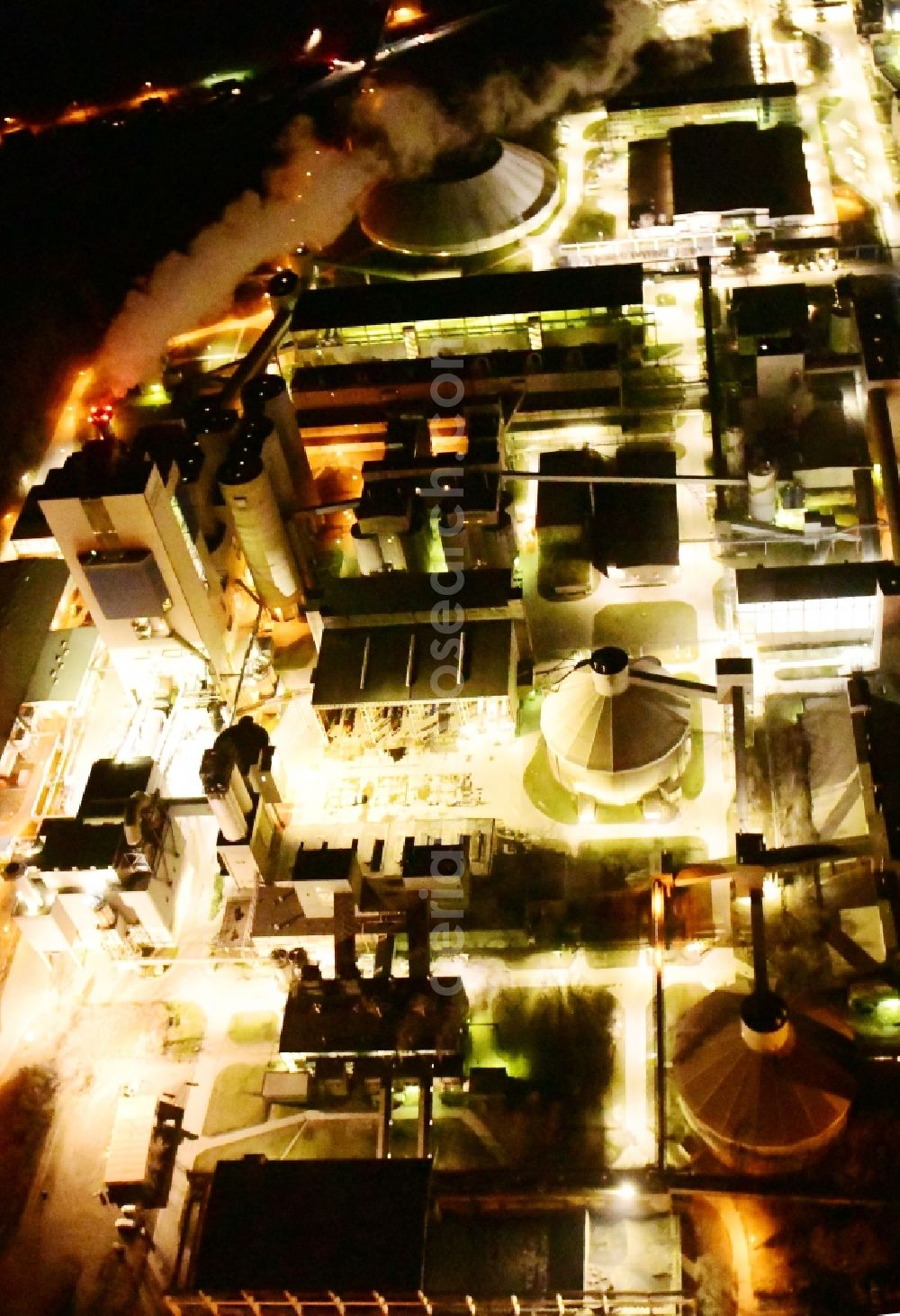 Aerial image at night Rüdersdorf - Night lighting cEMEX cement plant in Ruedersdorf in Brandenburg