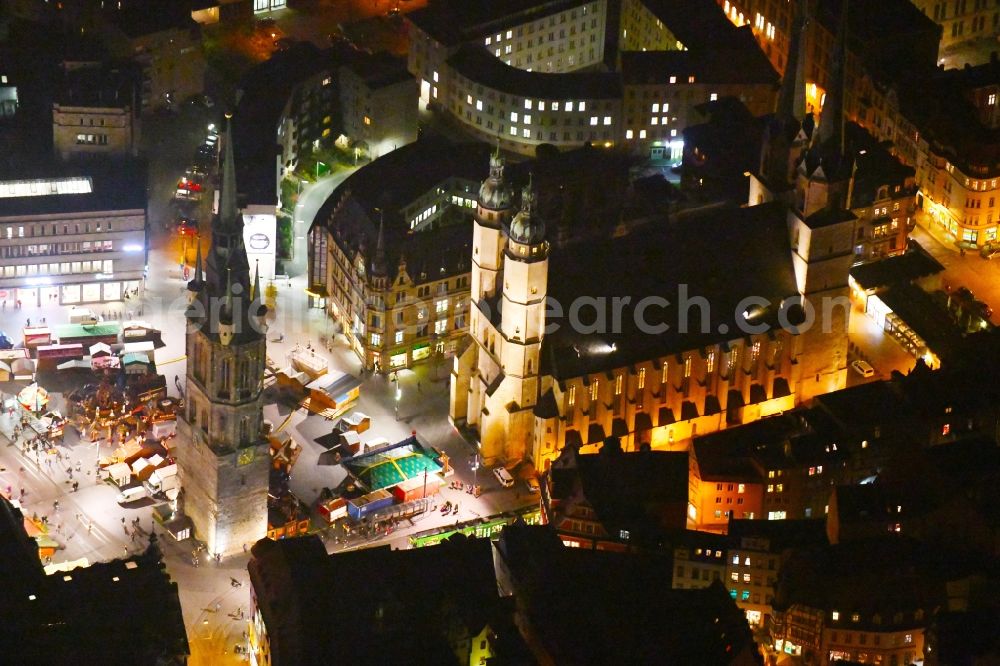 Aerial image at night Halle (Saale) - Night lighting View of the center of Halle view of the Red Tower and the St. Mary's Church in Saxony-Anhalt