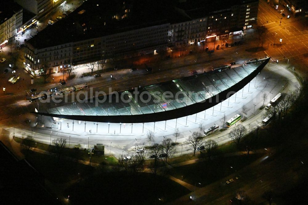 Aerial image at night Hamburg - Night lighting central Bus Station for Public Transportation on Carl-Legien-Platz - Adenauerallee in Hamburg, Germany