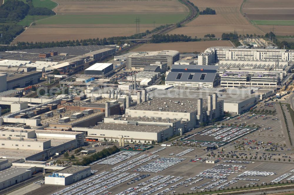 Aerial photograph Ingolstadt - Ingolstadt ist durch seine Funktion als Unternehmenssitz und größter Produktionsstandort des Automobilherstellers Audi, dem größten und wohl bekanntesten Ingolstädter Unternehmens, ein wichtiger Standort der Automobilindustrie. Kontakt: Audi Forum Ingolstadt, 85045 Ingolstadt; Tel 0800 2834444; Fax 0841 89-41860