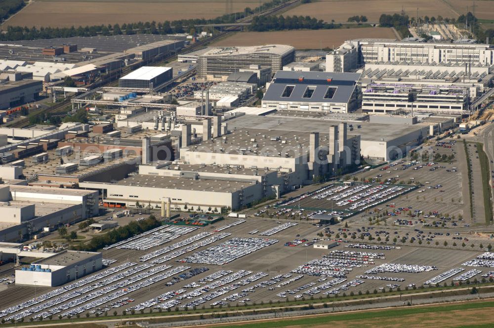 Ingolstadt from above - Ingolstadt ist durch seine Funktion als Unternehmenssitz und größter Produktionsstandort des Automobilherstellers Audi, dem größten und wohl bekanntesten Ingolstädter Unternehmens, ein wichtiger Standort der Automobilindustrie. Kontakt: Audi Forum Ingolstadt, 85045 Ingolstadt; Tel 0800 2834444; Fax 0841 89-41860