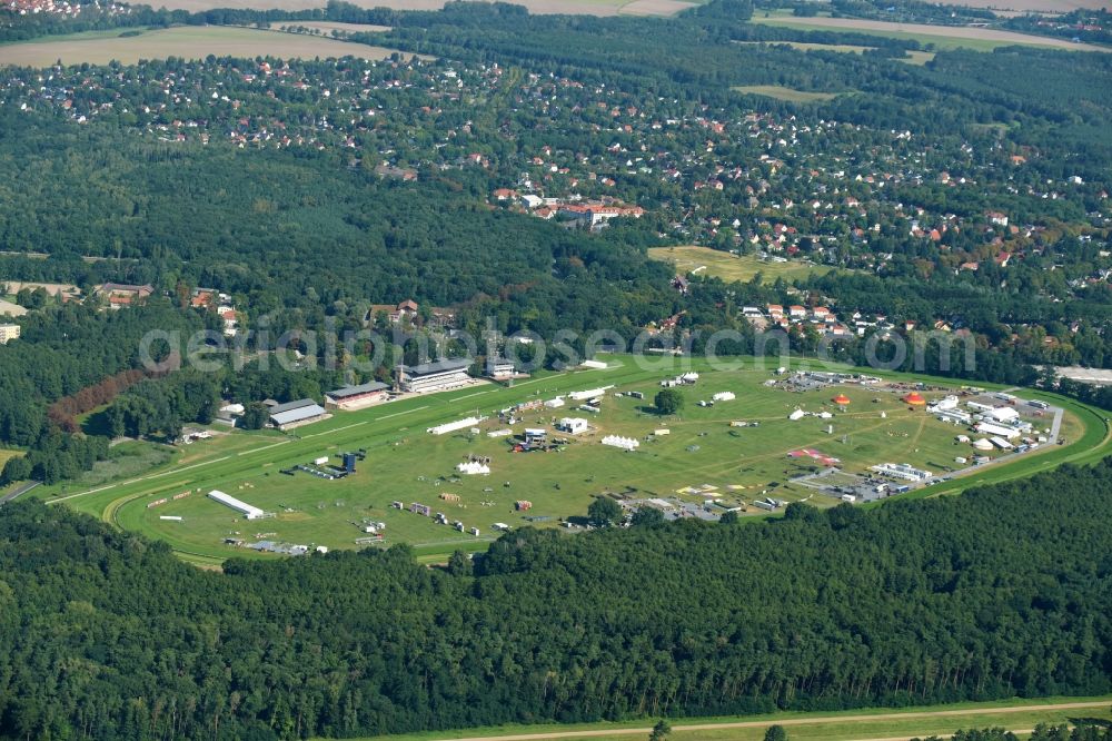 Aerial image Hoppegarten - Constructions to the music festival Lollapalooza at the Racetrack racecourse - trotting Rennbahn Hoppegarten GmbH & Co. KG on Goetheallee in Hoppegarten in the state Brandenburg, Germany